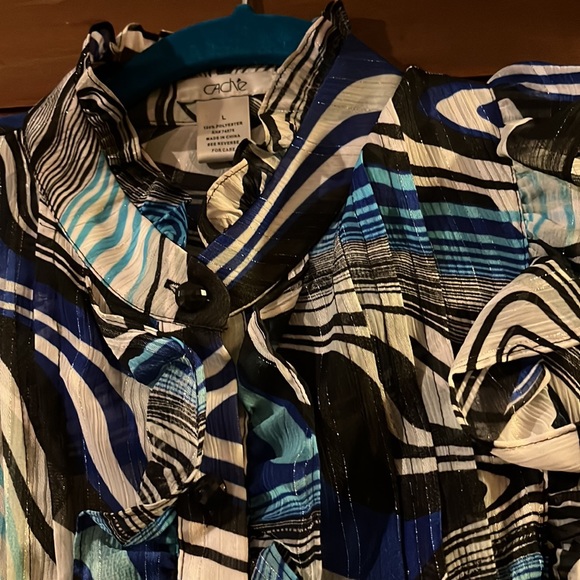 2 shades of blue, white, & black with a little silver. Sheer but not too much. - Picture 2 of 2